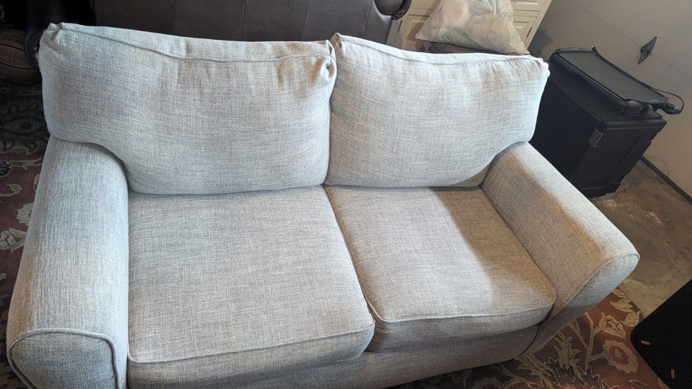 Cute Loveseat Couch .