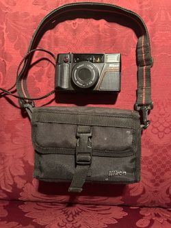 Nikon one touch 35mm camera, like new! Nikon camera case, included!