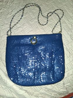 Vintage Whiting & Davis blue metal mesh shoulder bag with a gold-tone chain strap and clasp.