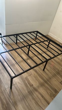 Queen size metal bed frame.
