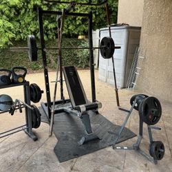 Weight Set Including weights, bench, racks, bars and power Station