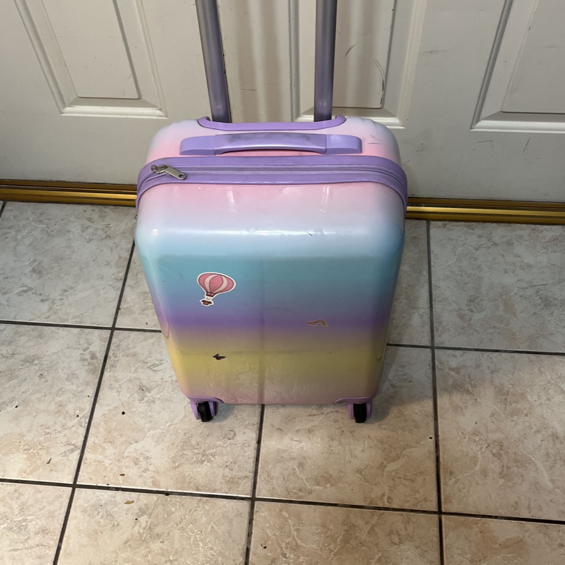 20 Inches Carry On Traveler’s Rainbow Luggage.