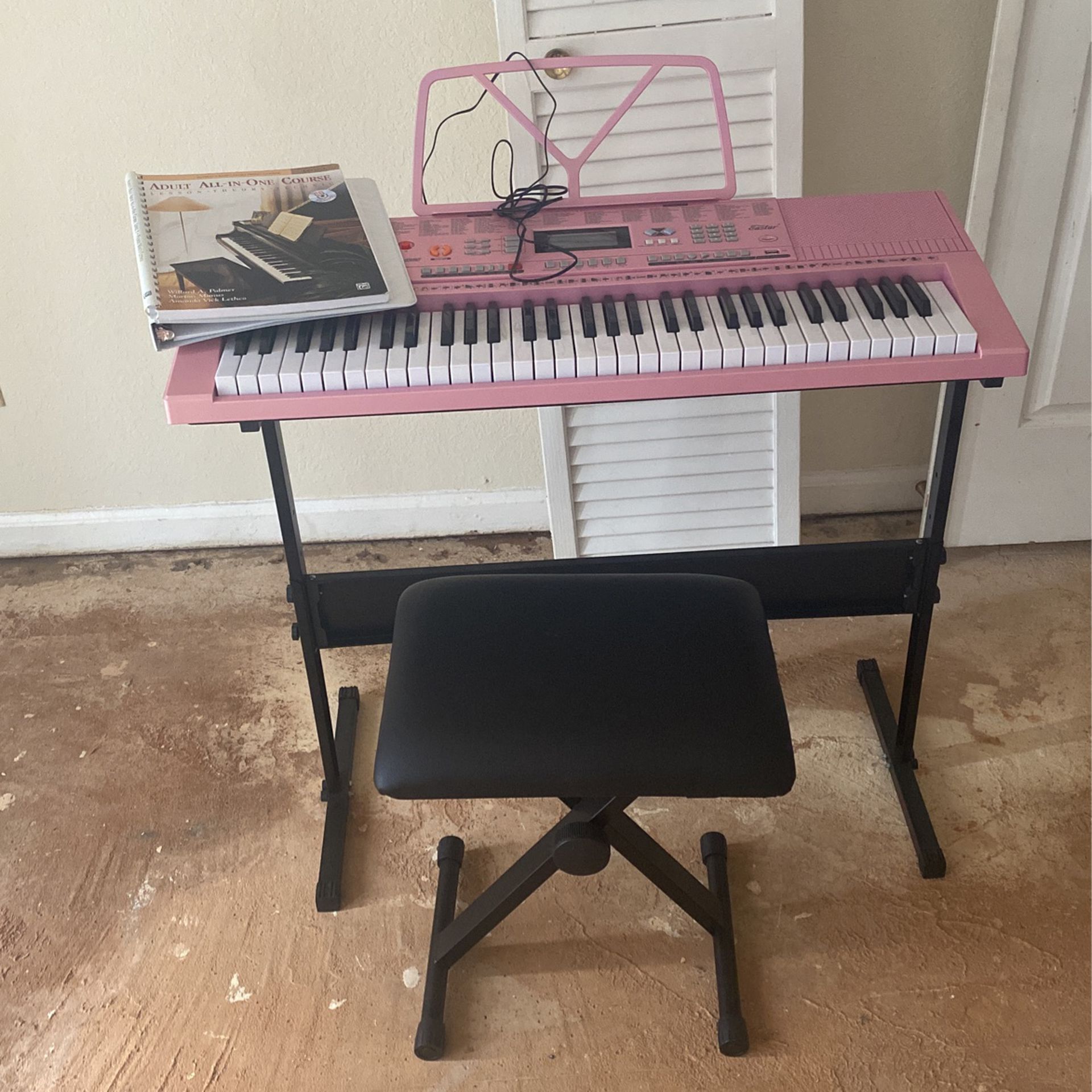 Like new Pink Piano Keyboard &Book & Stool $70