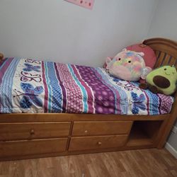 Twin Bed With 4 Drawers, Mattress Included If Interested. 