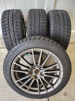 17 inch WRX wheels and Bridgestone Blizzaks at 90% tread