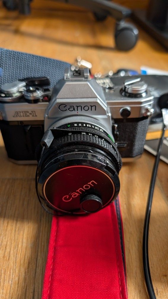 Canon AE-1 Manual Camera And Three Lenses