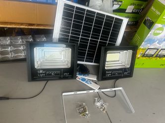 PRIVATE STREET  SOLAR LIGHT  2 solar lights and 1 panel  Plus 2 remote controls 2 bags of hardware  1200  WATTS