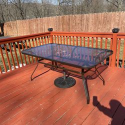 Table with loveseat and 3 chairs