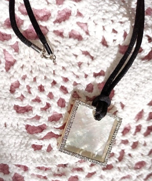Mother Of Pearl Surrounded With White Rhinestones Necklace