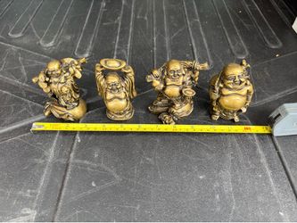 Four Buddha figurines in gold & bronze