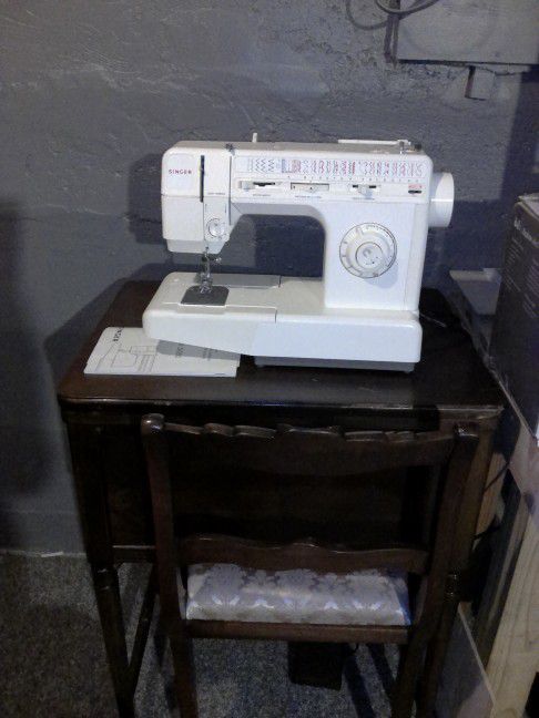 Singer Sewing Machine with Cabinet and chair