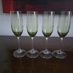 Set of four vintage olive green champagne flutes with clear stems