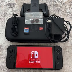 Nintendo Switch OLED + Mario Rabbids + 128GB SD CARD + OEM Black Joycons +Extras