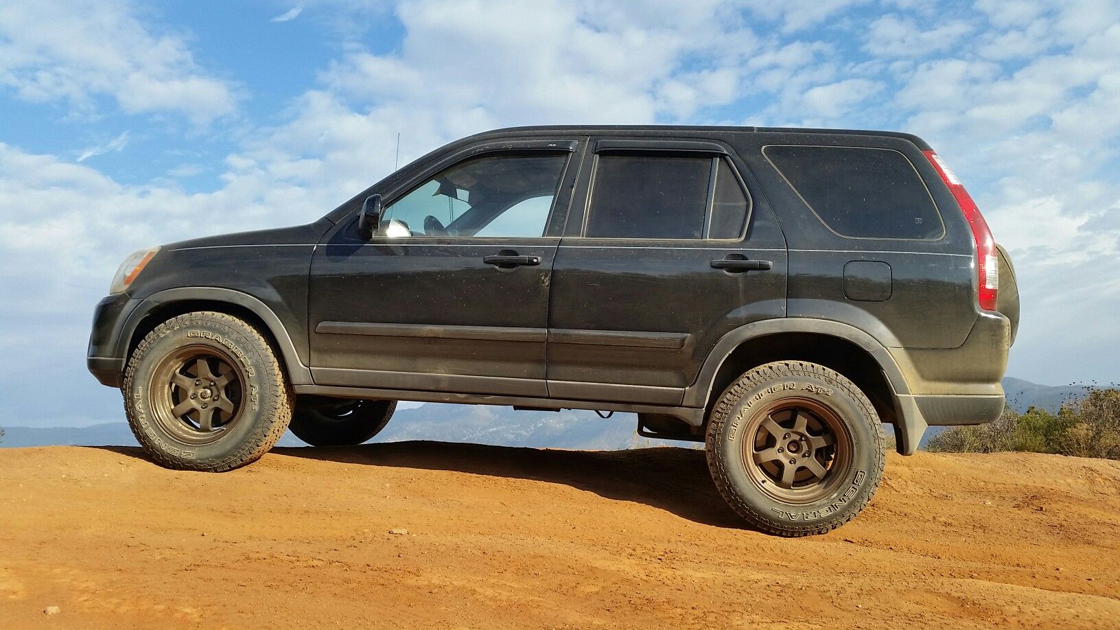 16x8 +20 Rota Grids with 235/70R16 General Grabber AT2 (29