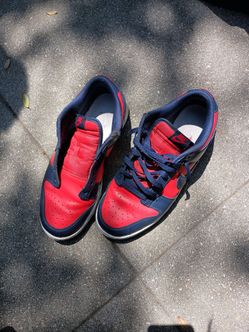 Red and navy blue Nike dunks