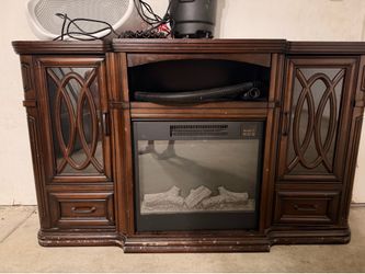 Entertainment center with heater/fireplace