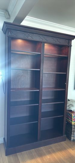 Dark wooden double bookcase