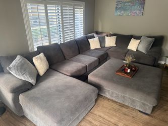 Large Gray Modular Sectional Sofa with a Matching Oversized Ottoman