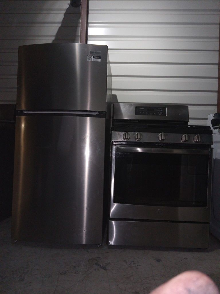 Frigidaire fridge Stainless with the GE Stove five earner