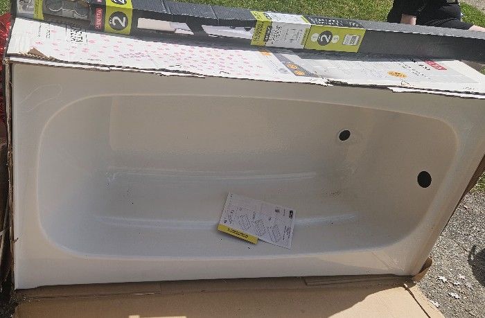 Brand New Tub And Sliding Glass Doors
