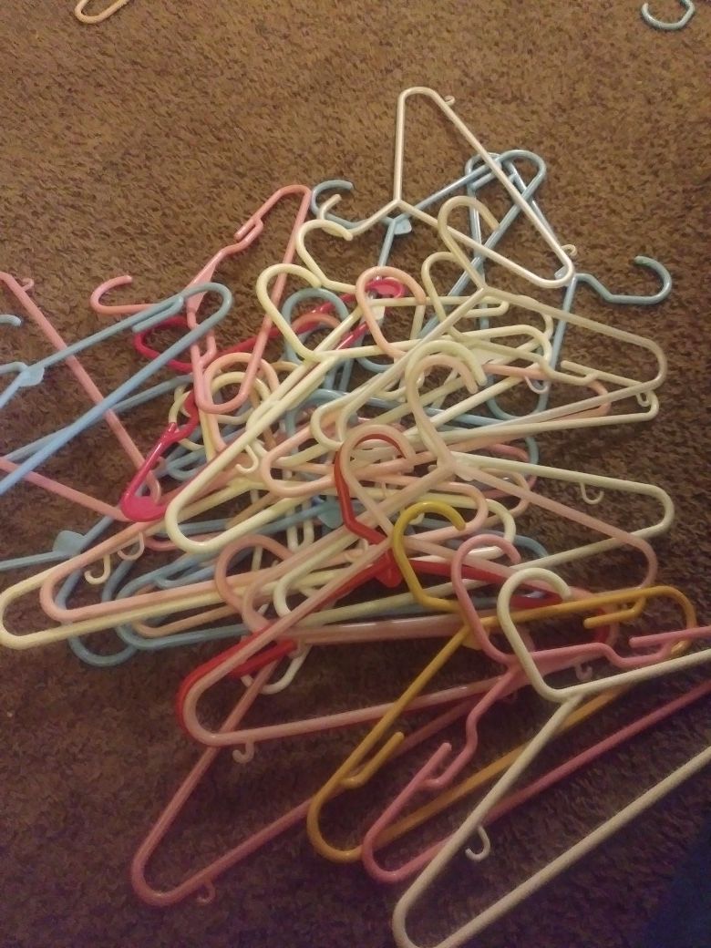 FREE...60 childrens plastic hangers