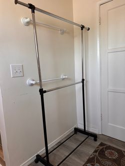 Room Essentials 2-Tier Adjustable Garment Rack – $15