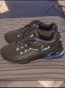Womens size 11 Fila Black Sneakers with Blue Accents