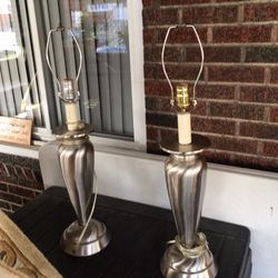 Two silver lamps w/o shades
