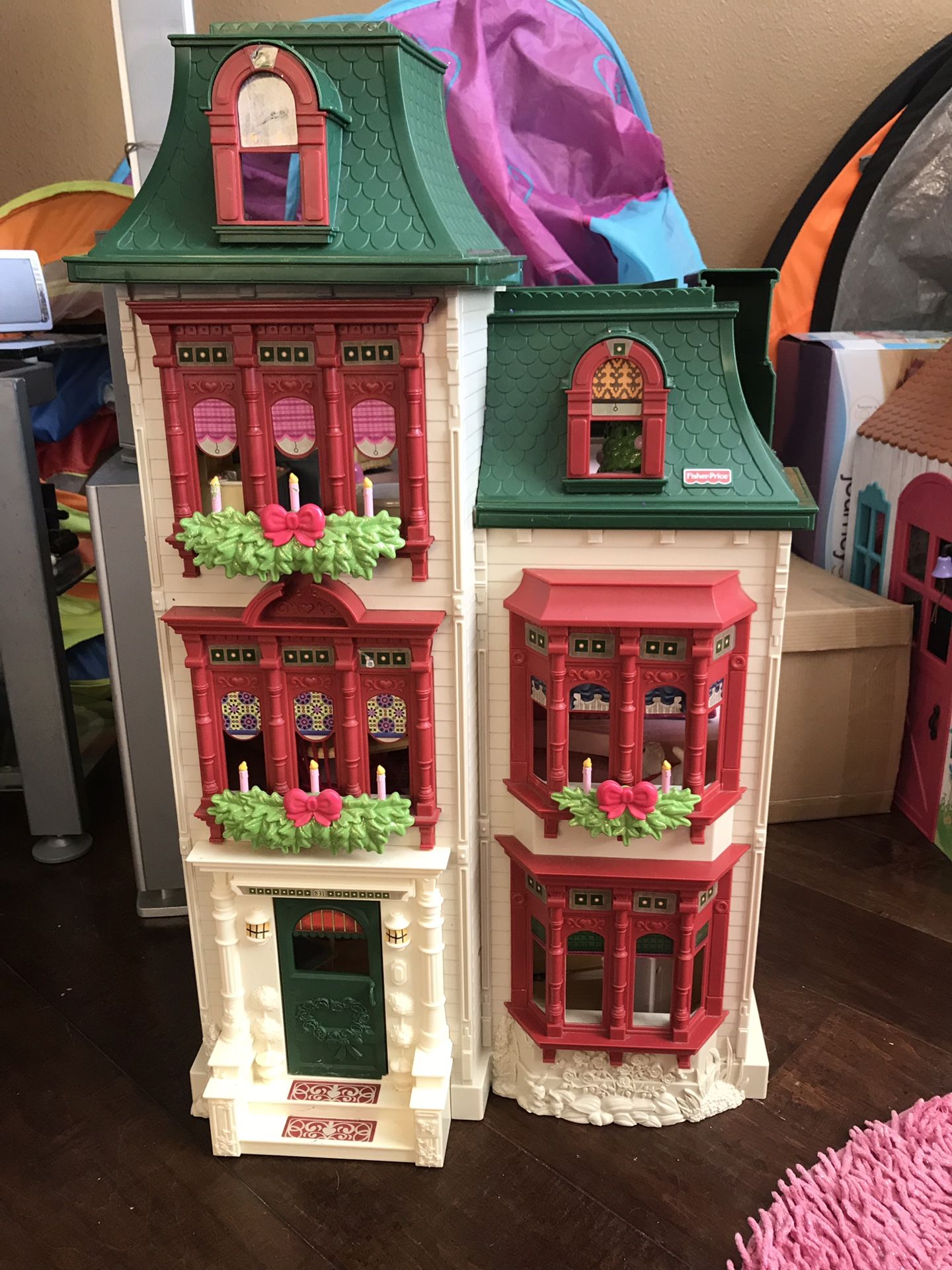 Fisher Price Doll house with dolls and furnishings