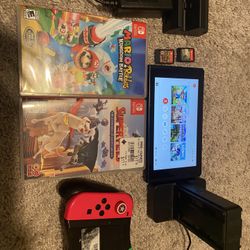 Nintendo Switch + 4 Games (hablo Espanol)