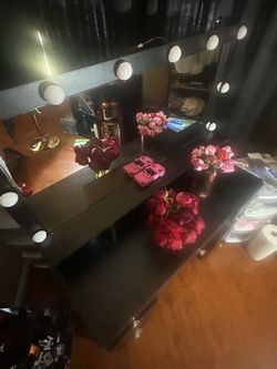 Black vanity with chair