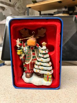 Holiday ornaments with tin box