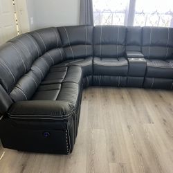 New 3 Reclining Power Sectional.  Black Leather.  116x104x41H.  Free Delivery!