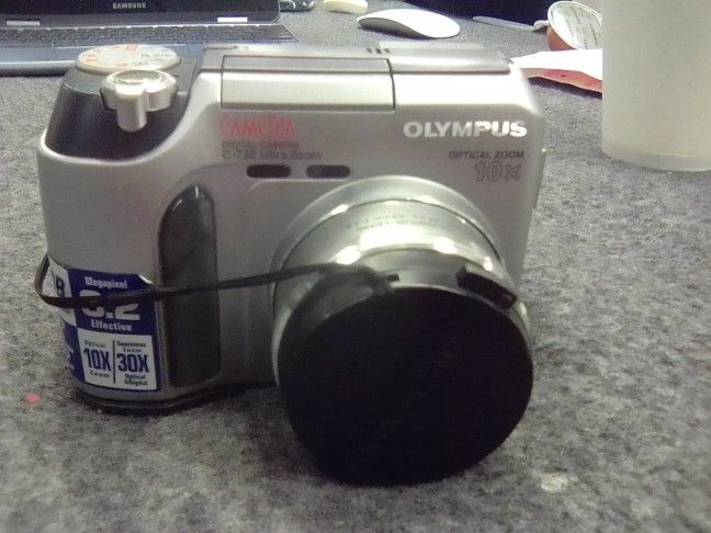 Olympus CAMEDIA C-730 Ultra Zoom 3.2MP Digital Camera - Metallic Silver 