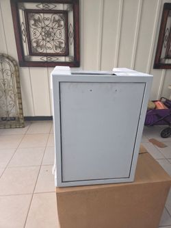 Stainless steel roll out trash/propane cabinet