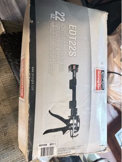 Double barrel caulk gun.