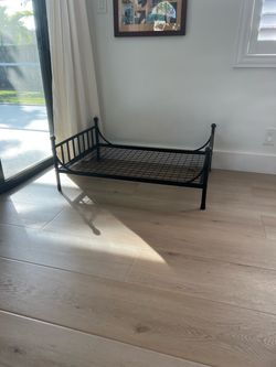 Metal couch dog frame