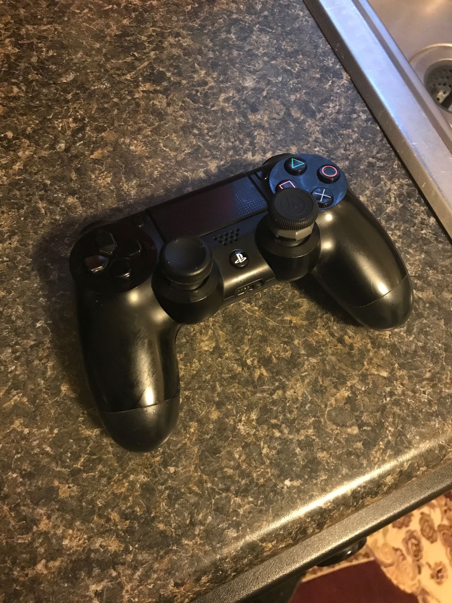 PS4 original controller (with grips)