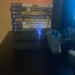 PlayStation 4 With Games And 2 Remotes 
