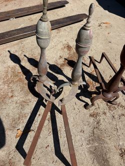 Antique metal andirons