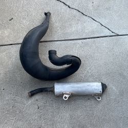 Stock Muffler And Tailpipe  From A Honda 250R 