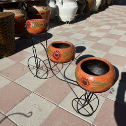 New Bike With Flower Pots Made Out Of Clay 