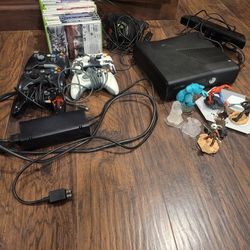 Xbox 360 with 16 games, Kinect and headset