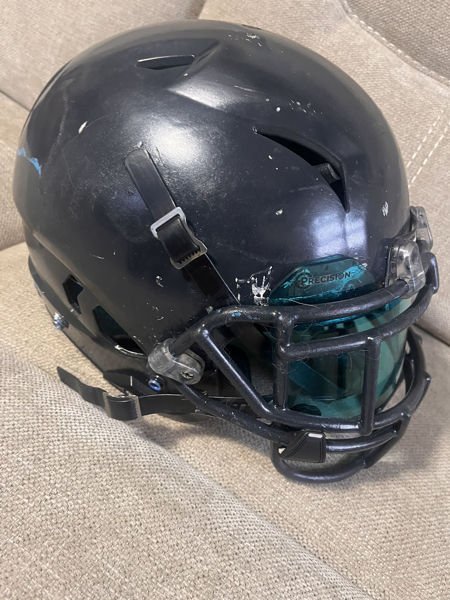Football helmet large an two pairs of shoulder pads