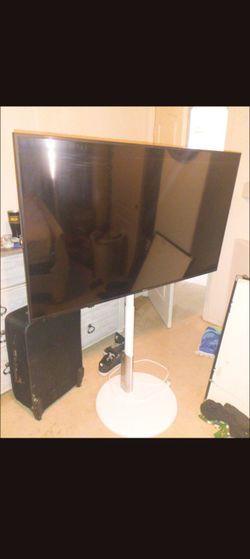Hisense 60 inch TV with portable TV Stand