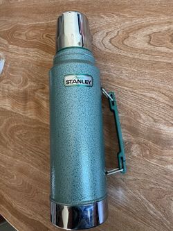 Aladdin Stanley Vacuum Bottle, specifically model https://offerup.com/redirect/?o=QS05NDRESC5JdA== has a 1-quart capacity (32 ounces)