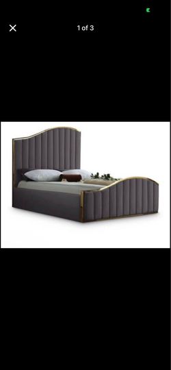Modern grey velvet king bed with gold trim