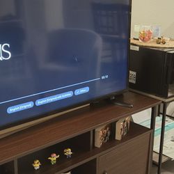 50' INCH TV AND STAND 