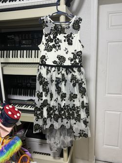 White Children’s Dress With Green Flower Deigns 