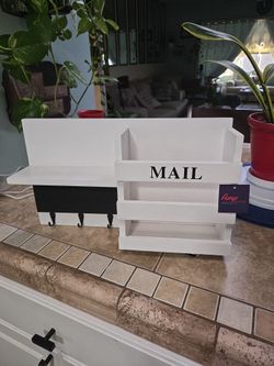 WHITE WITH BLACK SHELF WITH MAIL & 3 HUKS